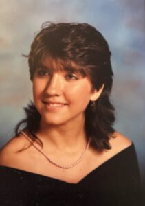 Debbie's senior picture. She was the first to graduate high school in her family.